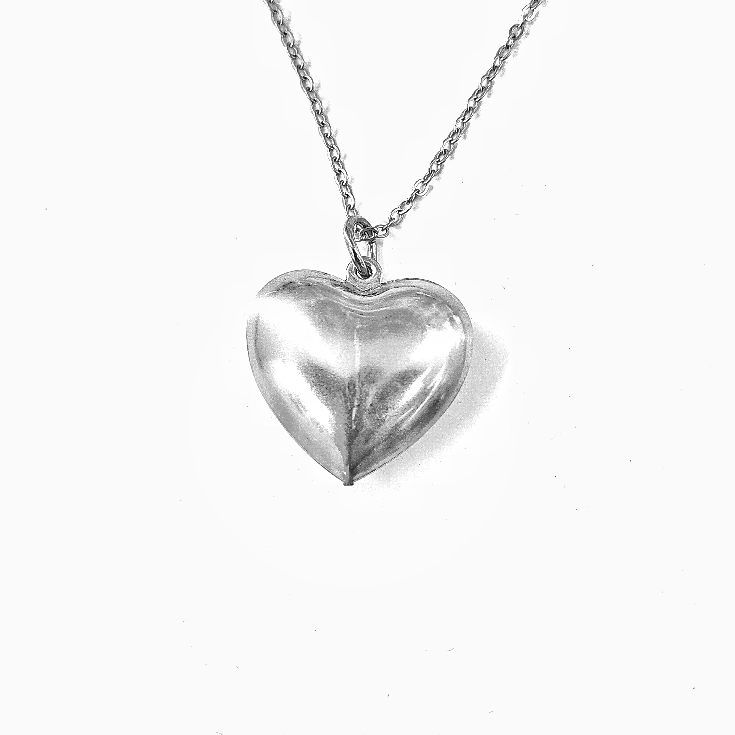 Collar corazon globo